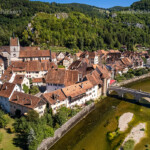 Die historische Altstadt von Saint-Ursanne aus der Luft gesehen, Schweiz, Europa | The historic old town of Saint-Ursanne seen from above, Switzerland, Europe