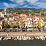 Stadtansicht mit Kirche San Maurizio und Marina Riva Ligure aus der Luft gesehen, Riviera di Ponente, Ligurien, Italien, Europa | Aerial view of Riva Ligure with Saint Maurice church and the marina, Riviera di Ponente, Liguria, Italy, Europe