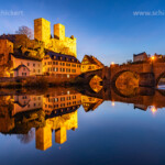 Die Burg Runkel über der Lahn in der Abenddämmerung, Runkel, Hessen, Deutschland | Runkel Castle above the Lahn river at dusk, Runkel, Hesse, Germany